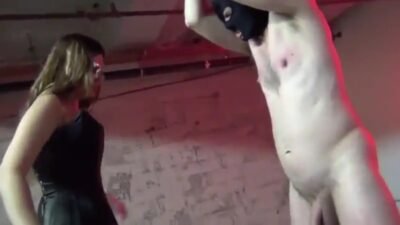 Domme Kicks And Spanks Cock Balls Ass Of Naked Male Slave